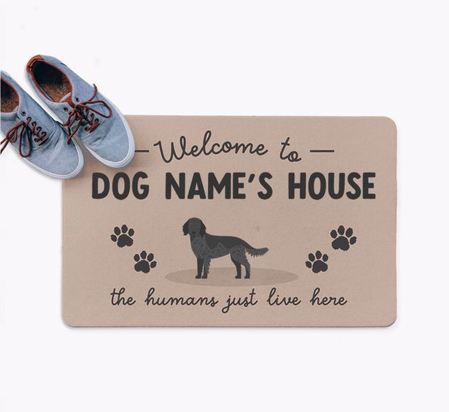 The Humans Just Live Here: Personalized {breedFullName} Doormat